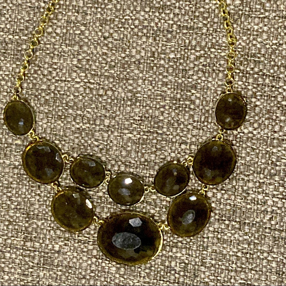 Necklace - dress it up or down. Crystal-like sheer black glass with gold chain.